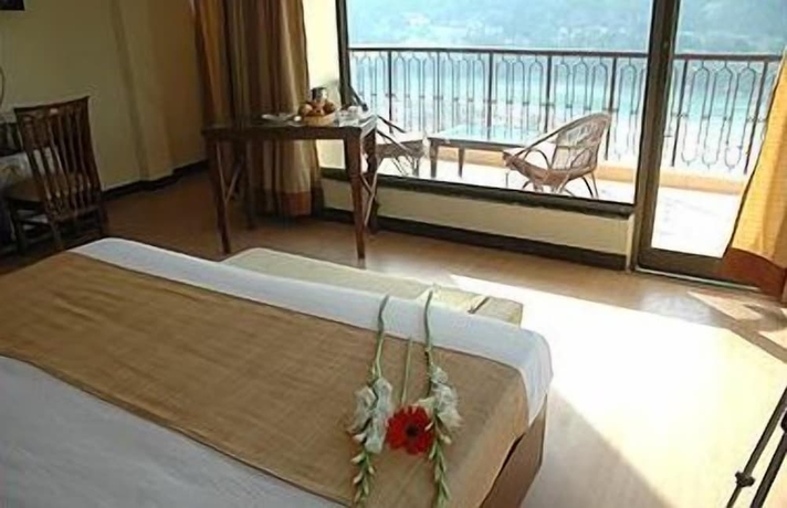 Imagen de la habitación del Hotel Divine Resort. Foto 6
