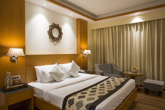 Imagen de la habitación del Hotel Divine Resort. Foto 10
