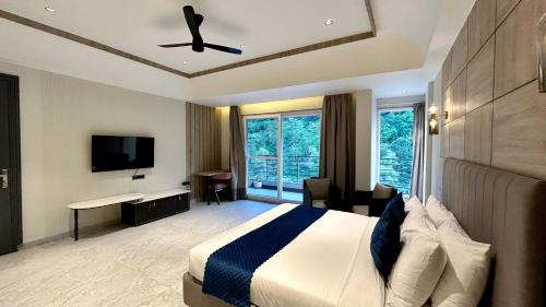 Imagen de la habitación del Hotel Divine River Resort by DLSs. Foto 19