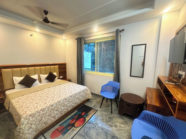 Imagen de la habitación del Hotel Divya Ganga Shivpuri Rishikesh. Foto 8