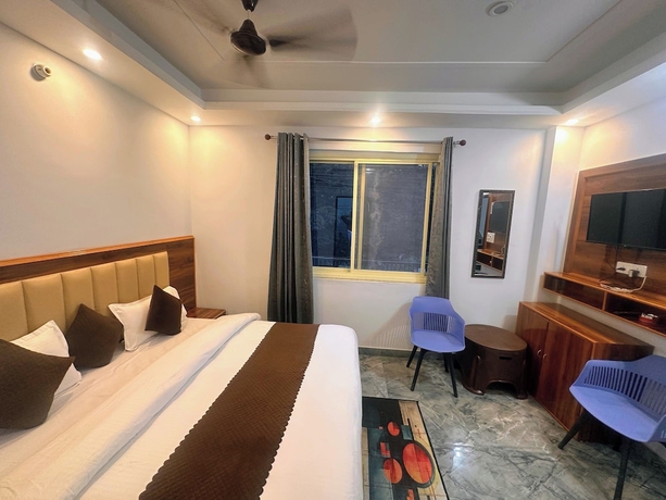 Imagen de la habitación del Hotel Divya Ganga Shivpuri Rishikesh. Foto 9