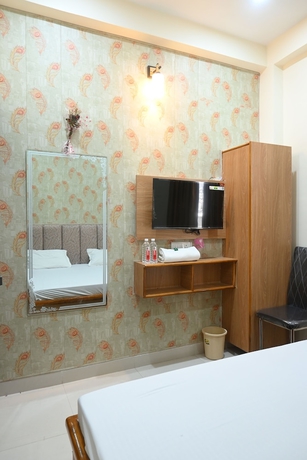 Imagen de la habitación del Hotel Divya Paying Guest House. Foto 4