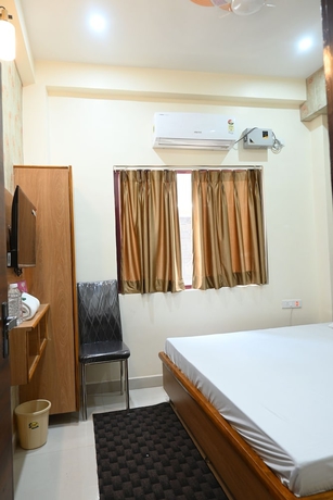 Imagen de la habitación del Hotel Divya Paying Guest House. Foto 5