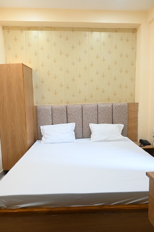 Imagen de la habitación del Hotel Divya Paying Guest House. Foto 6