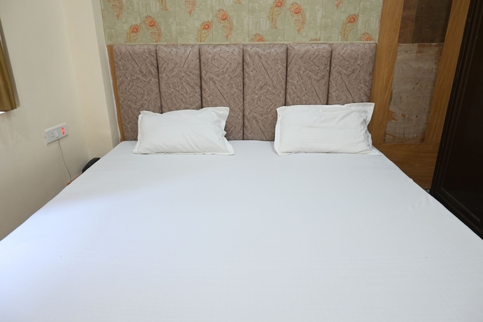 Imagen de la habitación del Hotel Divya Paying Guest House. Foto 7