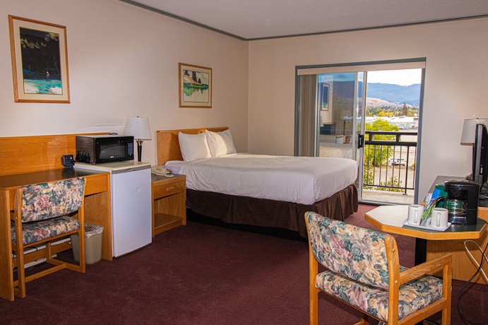 Imagen de la habitación del Hotel Divya Sutra Plaza and Conference Centre. Foto 5