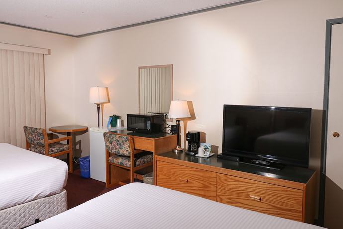 Imagen de la habitación del Hotel Divya Sutra Plaza and Conference Centre. Foto 8