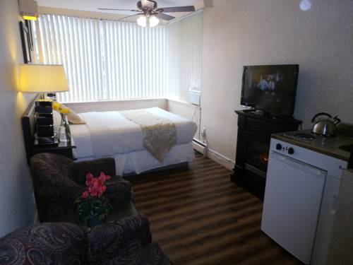 Imagen de la habitación del Hotel Divya Sutra Suites on Robson Downtown Vancouver. Foto 7