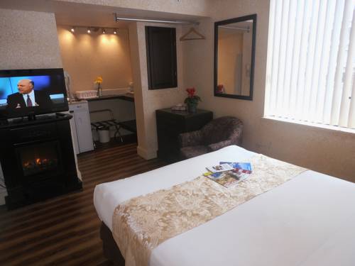 Imagen de la habitación del Hotel Divya Sutra Suites on Robson Downtown Vancouver. Foto 20