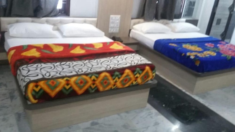 Imagen de la habitación del Hotel Divya palace and Restaurent. Foto 8