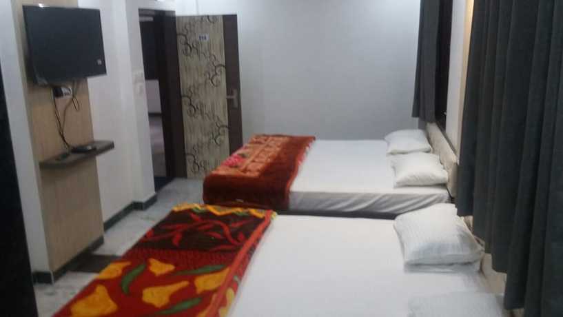 Imagen de la habitación del Hotel Divya palace and Restaurent. Foto 11