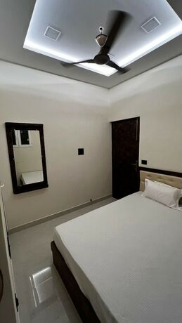Imagen de la habitación del Hotel Divyakashi Homestay. Foto 16