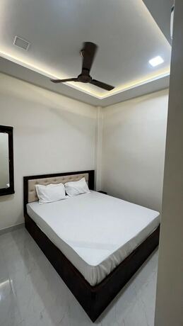 Imagen de la habitación del Hotel Divyakashi Homestay. Foto 18