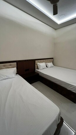 Imagen de la habitación del Hotel Divyakashi Homestay. Foto 20