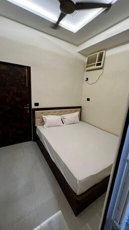Imagen de la habitación del Hotel Divyakashi Homestay. Foto 21