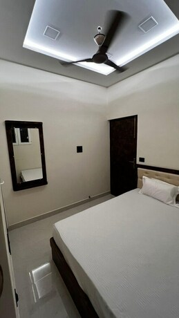 Imagen de la habitación del Hotel Divyakashi Homestay. Foto 22
