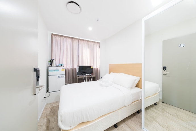 Imagen de la habitación del Hotel Dixon Residences. Foto 13