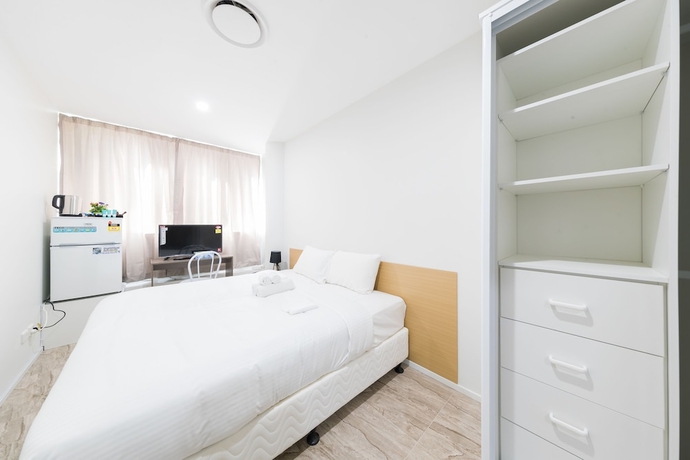 Imagen de la habitación del Hotel Dixon Residences. Foto 14