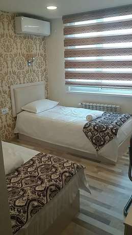 Imagen de la habitación del Hotel Diyor. Foto 8