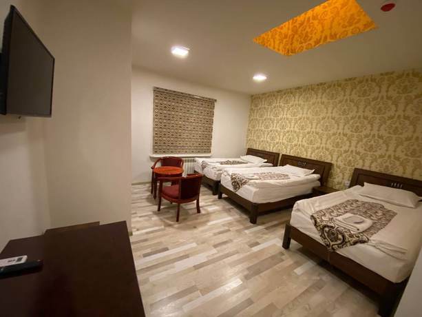 Imagen de la habitación del Hotel Diyor. Foto 9
