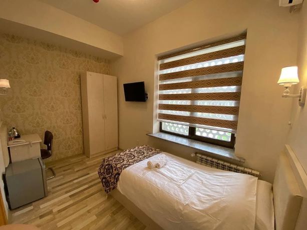 Imagen de la habitación del Hotel Diyor. Foto 12