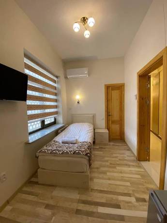 Imagen de la habitación del Hotel Diyor. Foto 14