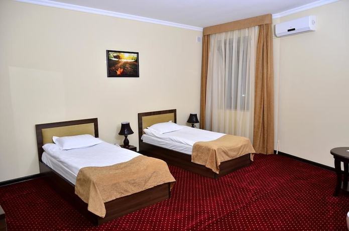 Imagen de la habitación del Hotel Diyora Malika. Foto 11
