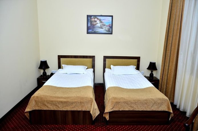 Imagen de la habitación del Hotel Diyora Malika. Foto 14