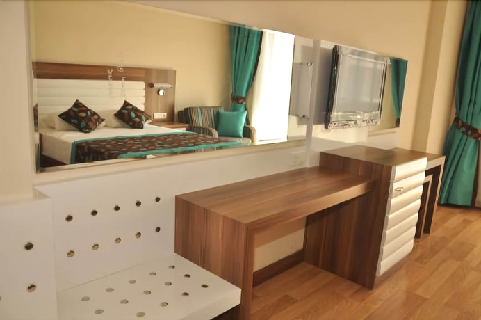 Imagen de la habitación del Hotel Dizalya Palm Garden - All Inclusive. Foto 8