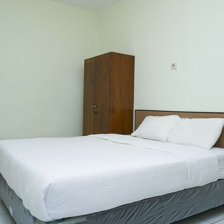 Imagen de la habitación del Hotel Djuragan Kamar The Basic. Foto 19