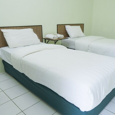 Imagen general del Hotel Djuragan Kamar The Basic. Foto 13
