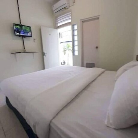 Imagen general del Hotel Djuragan Kamar The Basic. Foto 15