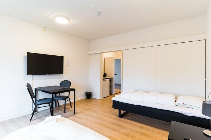 Imagen de la habitación del Hotel Djurs Housing. Foto 16