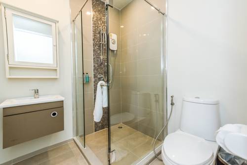 Imagen de la habitación del Hotel Dlux Condominium. Foto 9