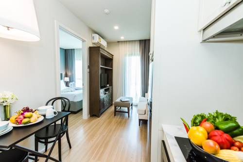 Imagen de la habitación del Hotel Dlux Condominium. Foto 11
