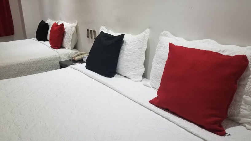 Imagen de la habitación del Hotel Dluxe and Suites. Foto 2