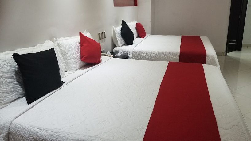 Imagen de la habitación del Hotel Dluxe and Suites. Foto 4