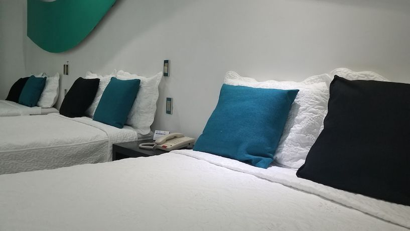 Imagen de la habitación del Hotel Dluxe and Suites. Foto 5