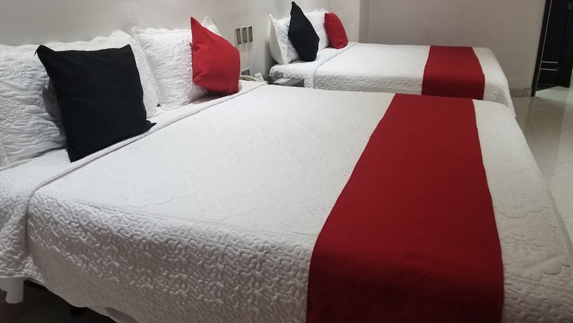 Imagen de la habitación del Hotel Dluxe and Suites. Foto 6