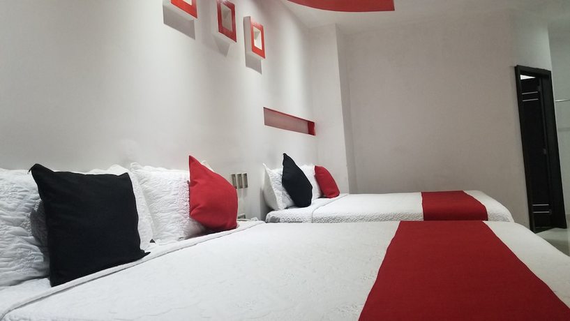 Imagen de la habitación del Hotel Dluxe and Suites. Foto 9