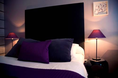 Imagen de la habitación del Hotel Dm. Foto 4