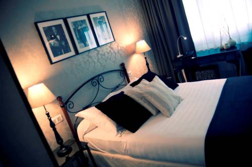 Imagen de la habitación del Hotel Dm. Foto 7