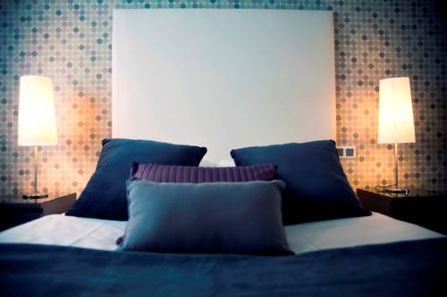 Imagen de la habitación del Hotel Dm. Foto 8