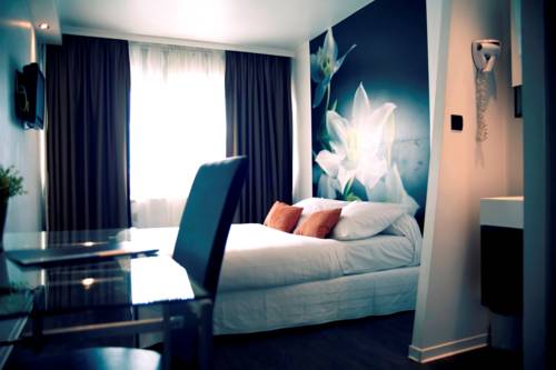 Imagen de la habitación del Hotel Dm. Foto 10