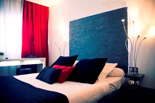 Imagen de la habitación del Hotel Dm. Foto 11