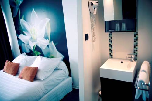 Imagen de la habitación del Hotel Dm. Foto 16