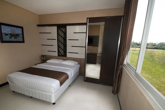 Imagen de la habitación del Hotel D'madinah Residence Syariah Solo. Foto 3