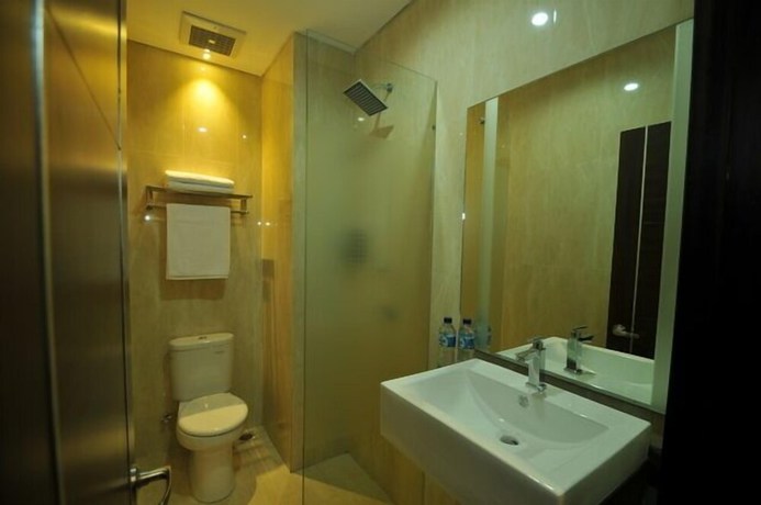 Imagen de la habitación del Hotel D'madinah Residence Syariah Solo. Foto 5