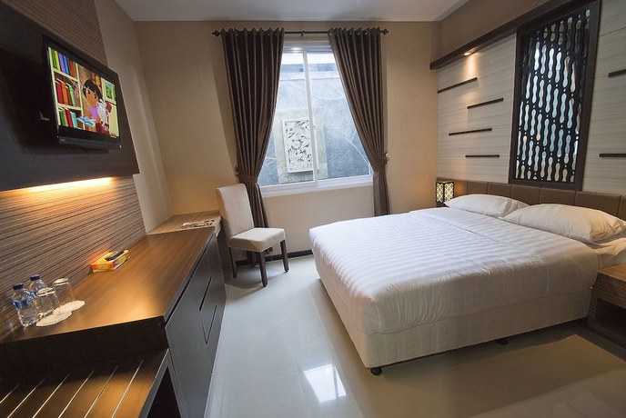 Imagen de la habitación del Hotel D'madinah Residence Syariah Solo. Foto 6