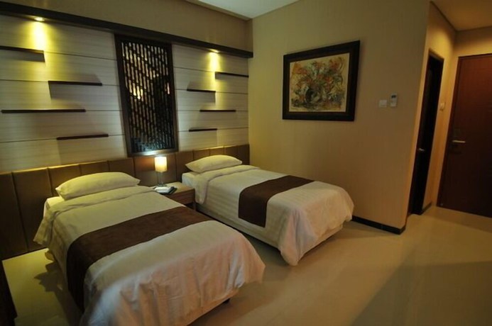 Imagen de la habitación del Hotel D'madinah Residence Syariah Solo. Foto 9